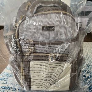 Brand new Itzy Ritzy Boss Backpack Diaper Bag